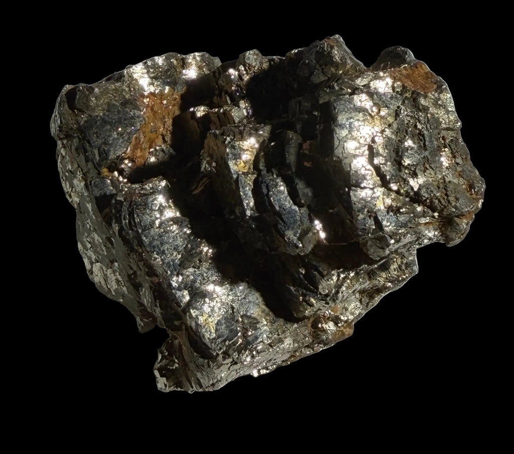 Pyrite mineral specimen with metallic luster and cubic crystals, natural rock formation