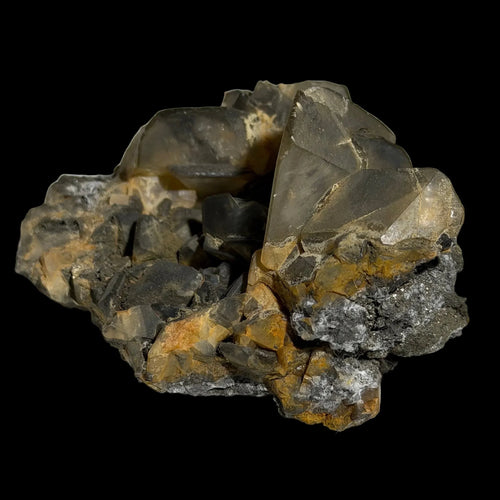 Fluorite crystal specimen with yellow and gray hues, showcasing natural mineral formations and geological textures