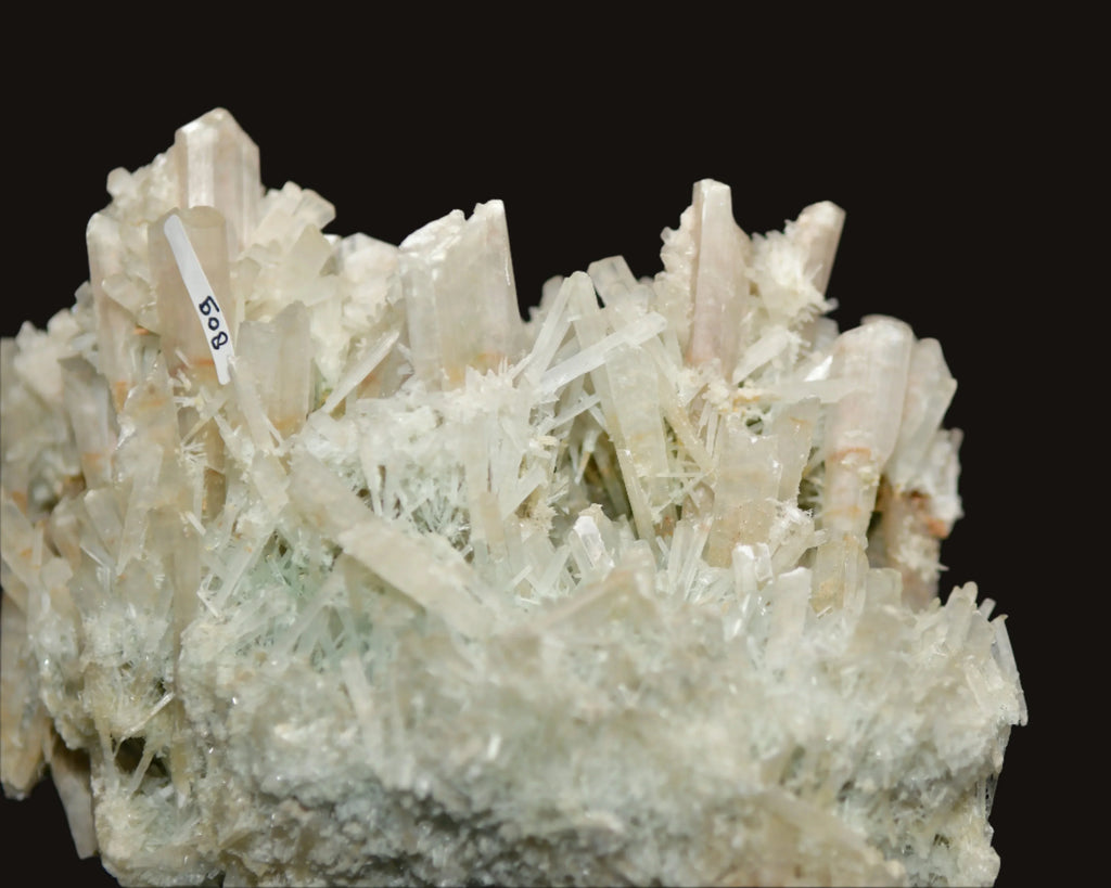 White crystal cluster with needle-like formations, labeled 508, ideal for mineral collectors