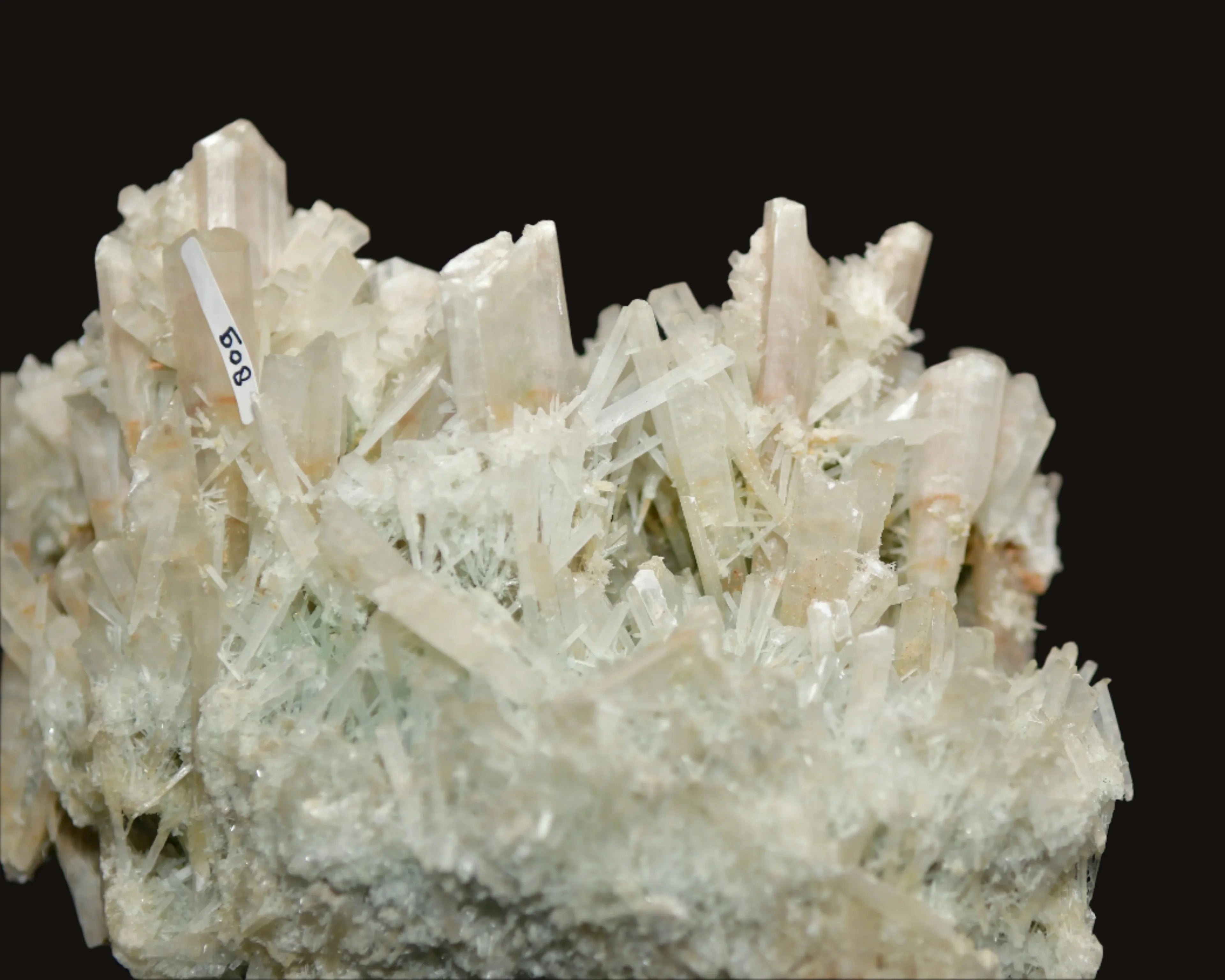 White crystal cluster with needle-like formations, labeled 508, ideal for mineral collectors