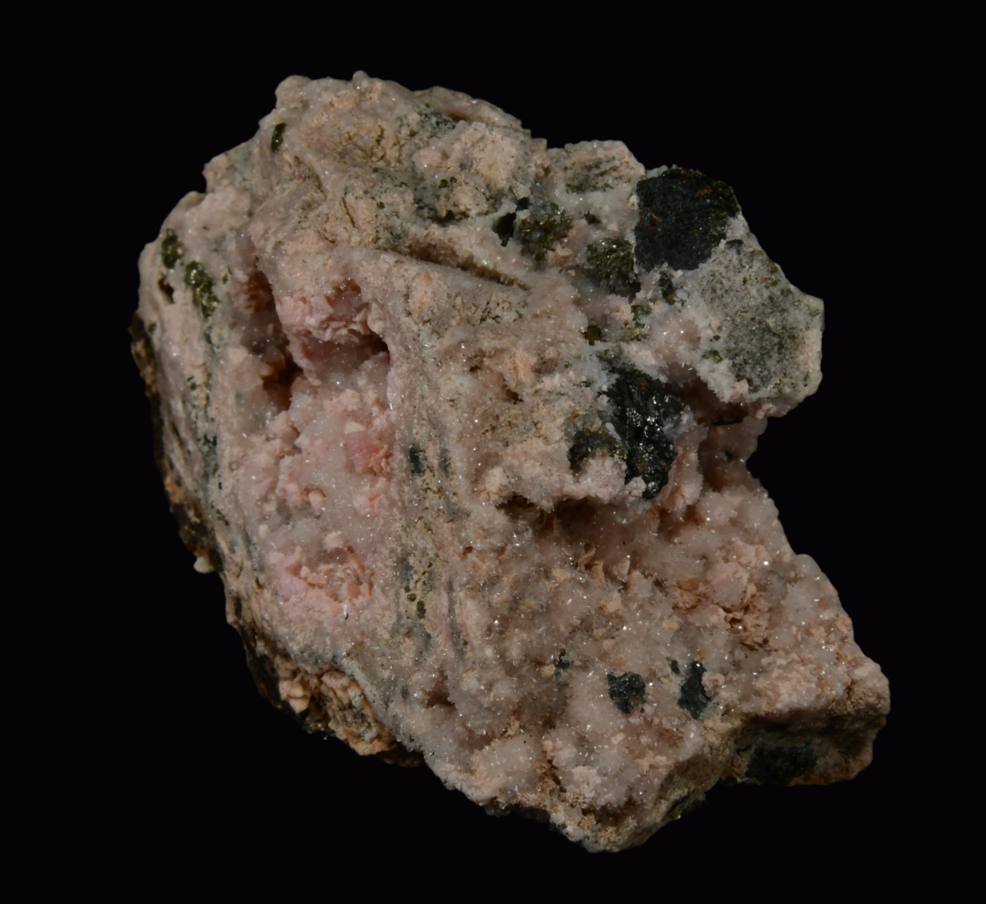 RHODOCHROSITE associated with PYRITE, QUARTZ (small cabinet)