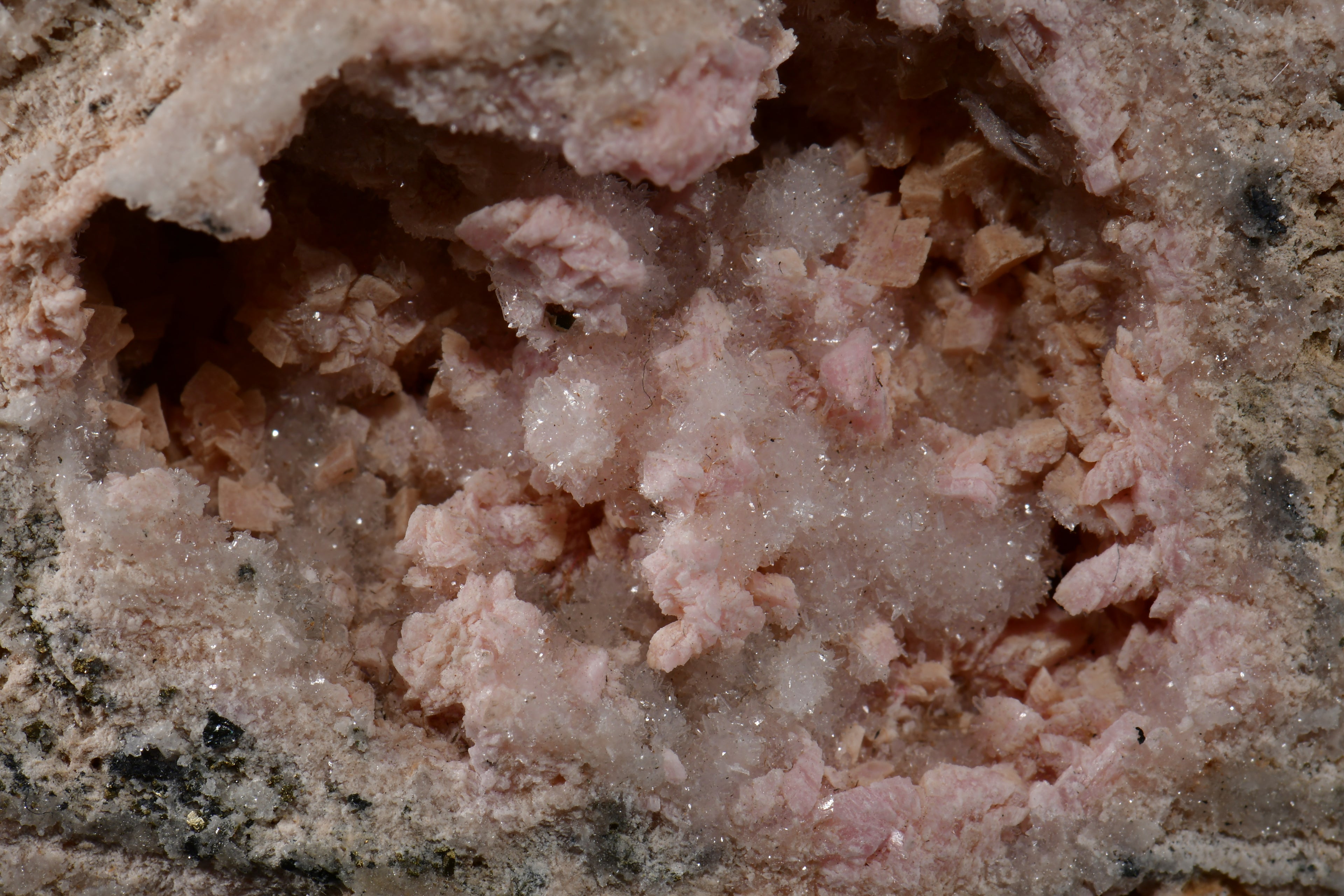 RHODOCHROSITE associated with PYRITE, QUARTZ (small cabinet)