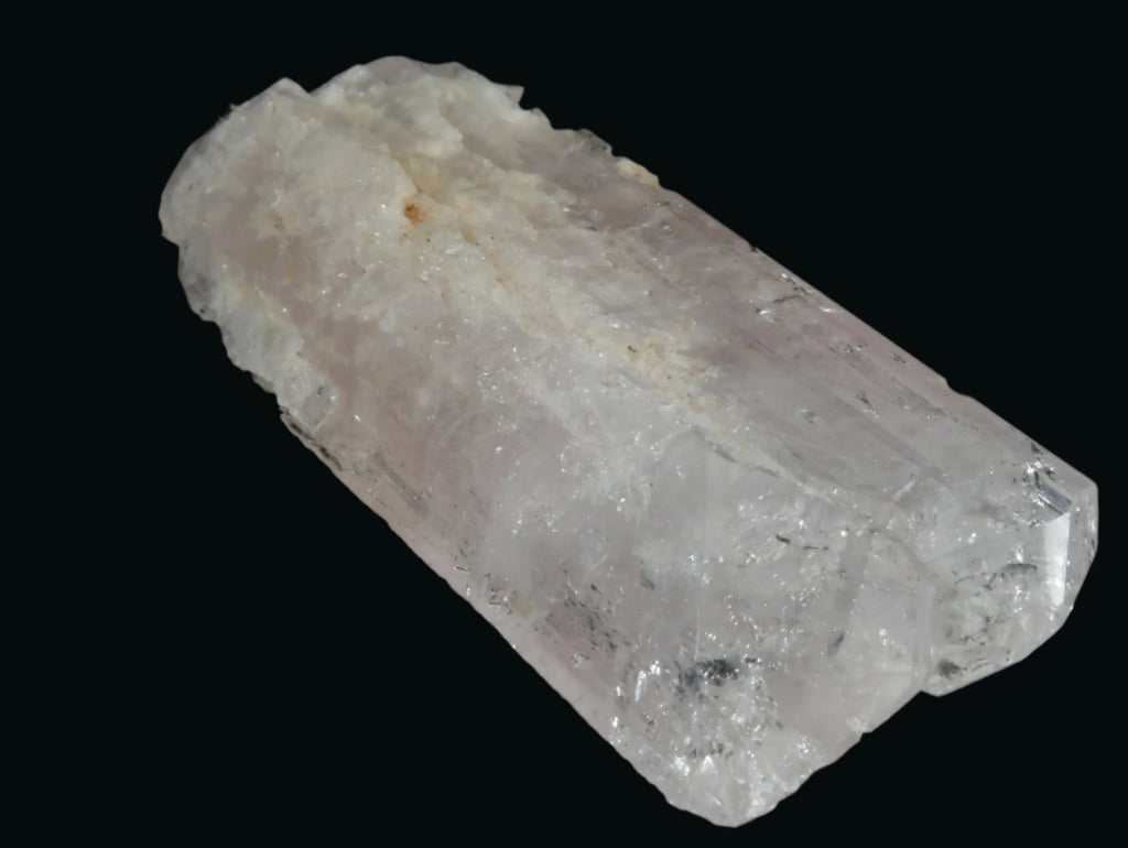 Pink Kunzite crystal specimen with natural matrix, showcasing translucent facets and mineral inclusions
