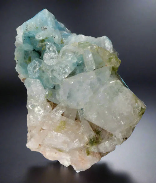 Aquamarine crystal specimen from Brazil, showcasing vibrant blue and clear mineral formations