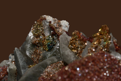 Chalcopyrite on Quartz from Peru, sparkling golden crystals with iridescent hues on clear quartz matrix