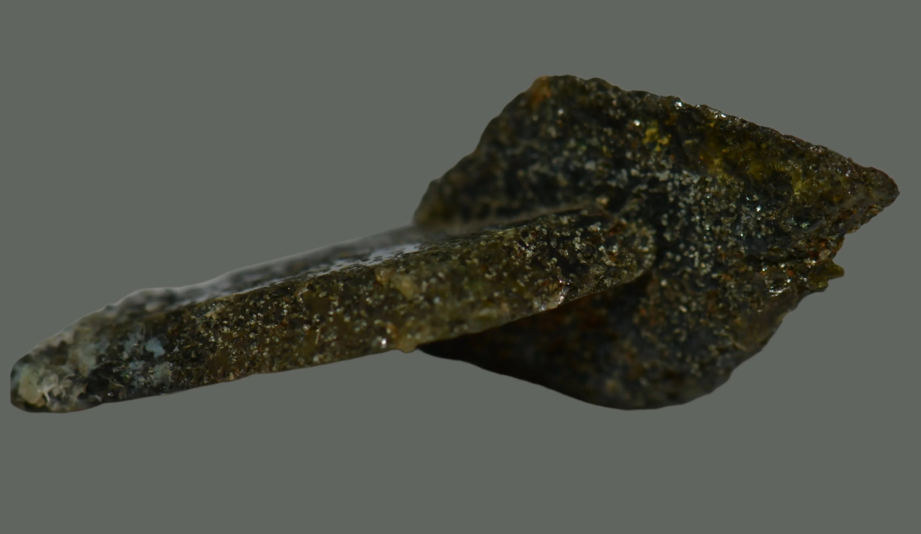 Chalcopyrite mineral specimen with metallic luster and greenish-yellow hues, ideal for collectors