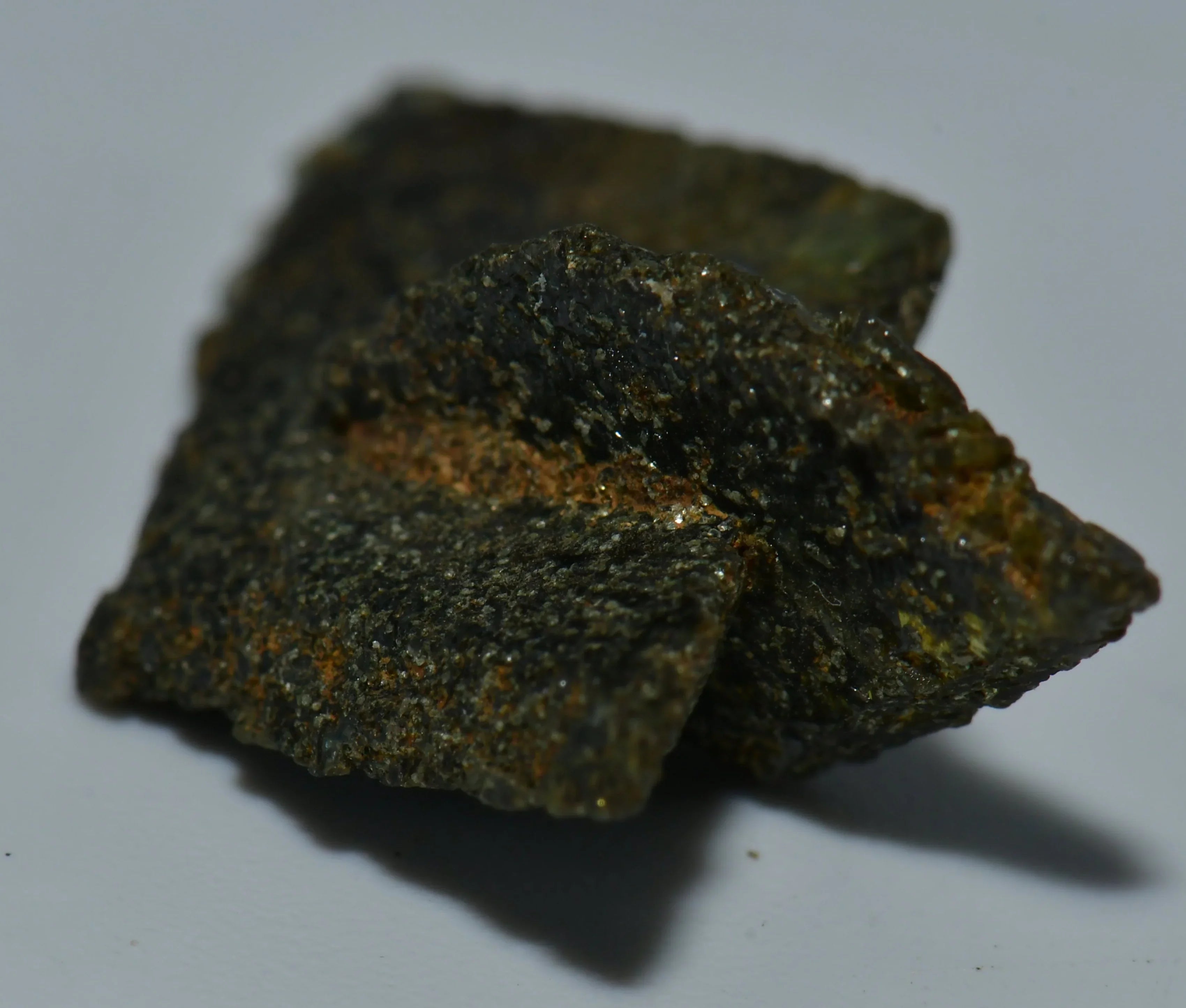 Chalcopyrite mineral specimen with metallic luster and greenish-black matrix, ideal for collectors