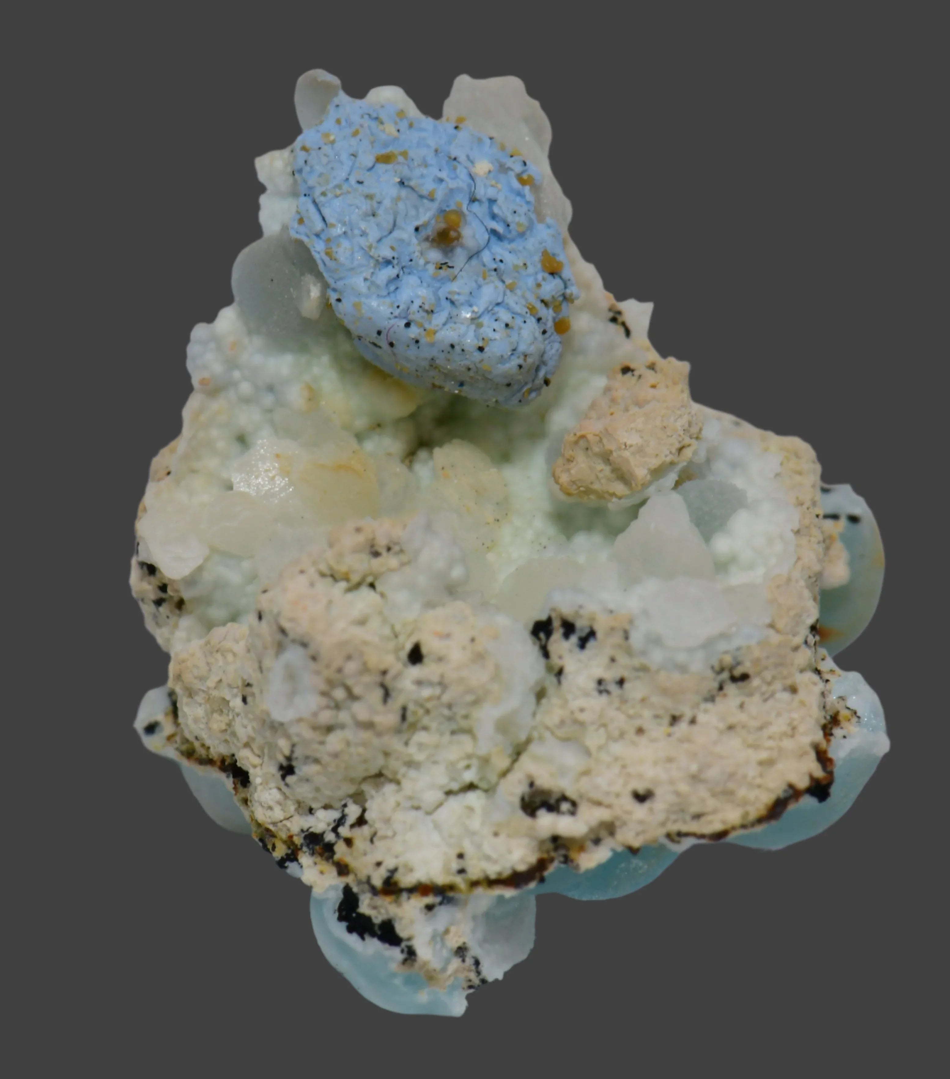 Smithsonite mineral specimen with blue and white crystal formations, ideal for collectors and geological study.