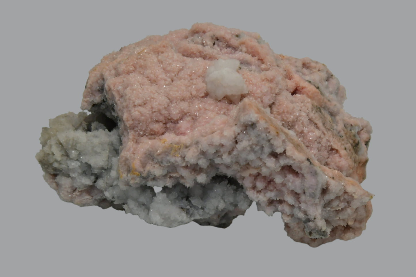 RHODOCHROSITE associated with PYRITE