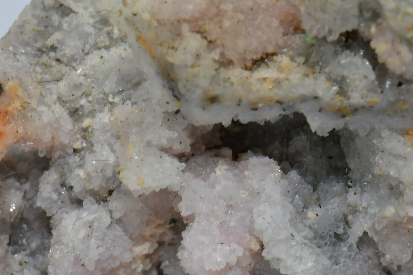 RHODOCHROSITE associated with PYRITE