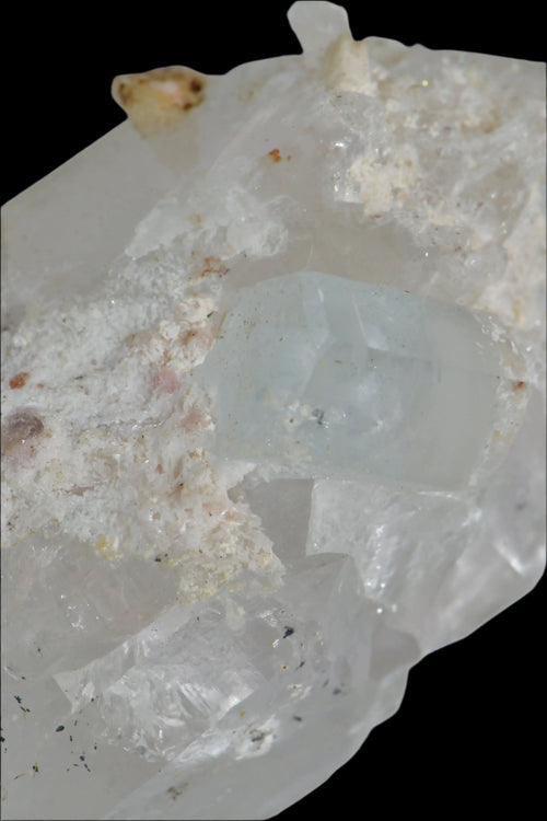 Clear quartz crystal cluster with subtle inclusions, showcasing natural mineral formations