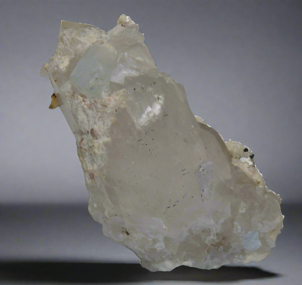 AQUAMARINE (BERYL) ON QUARTZ