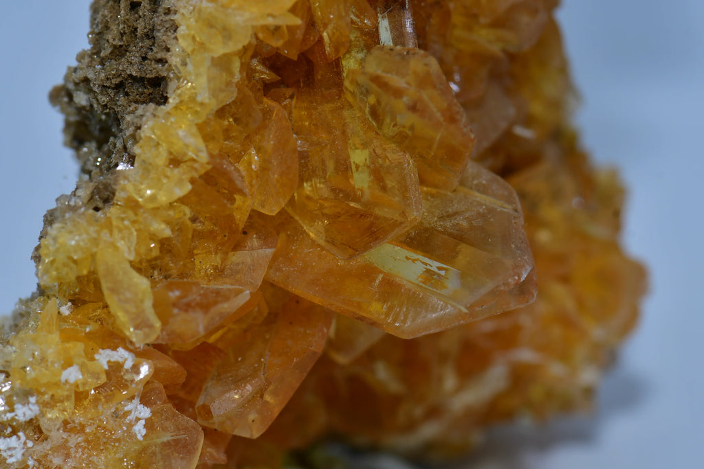 Wulfenite mineral specimen with vibrant orange crystals from classic locality