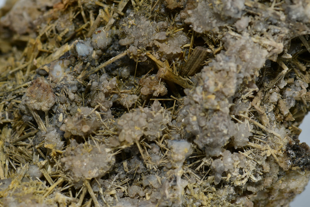 Calcite crystals with needle-like inclusions from classic locality