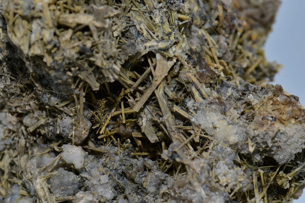 Yellow needle-like crystals on matrix, mineral specimen for collectors