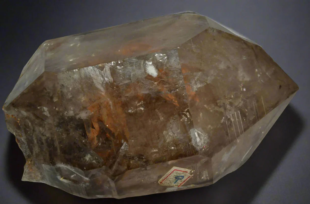 Smoky Quartz Crystal from Brazil, large transparent specimen with golden-brown inclusions and geometric facets